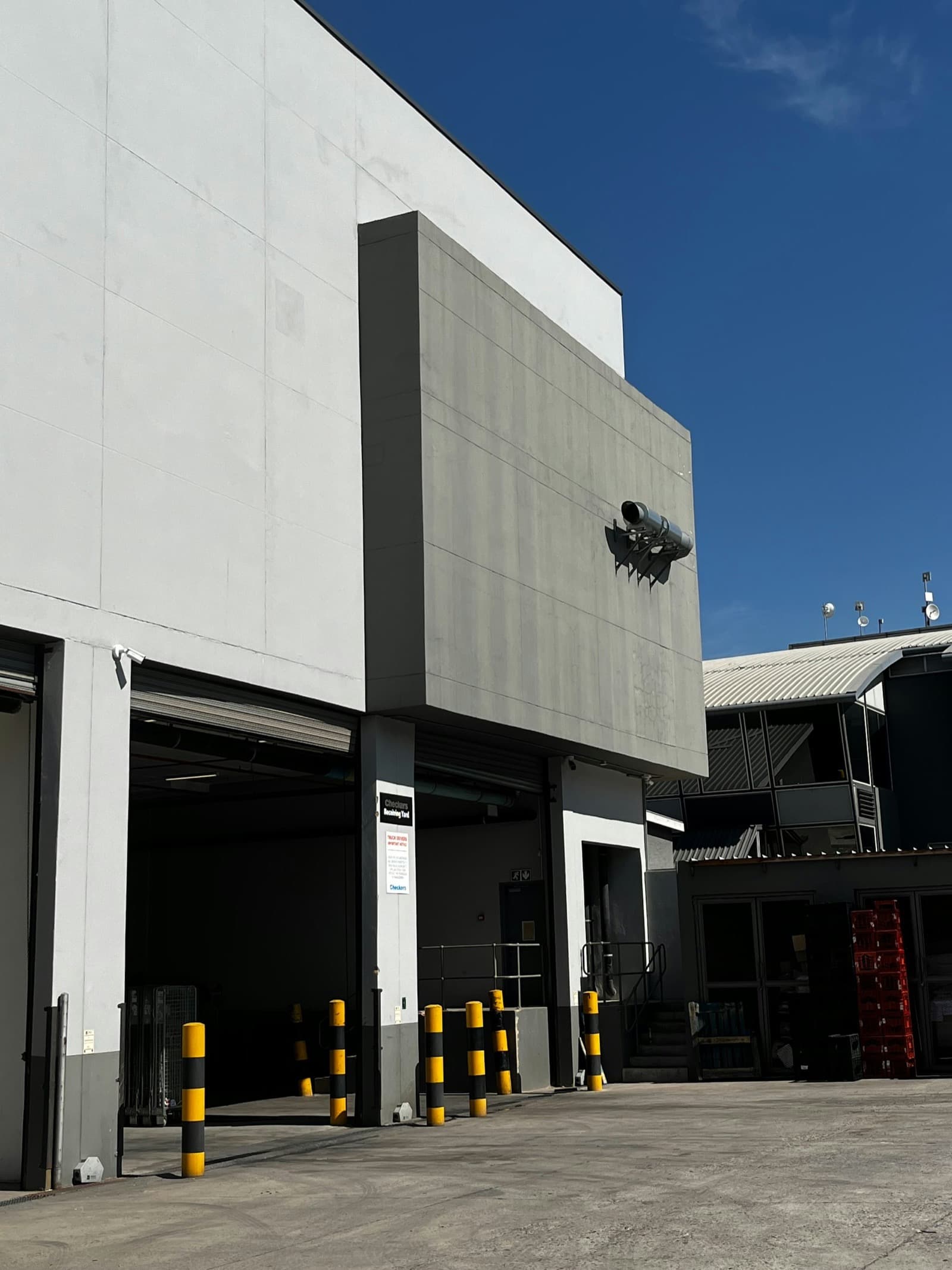 Security officer patrolling a warehouse facility